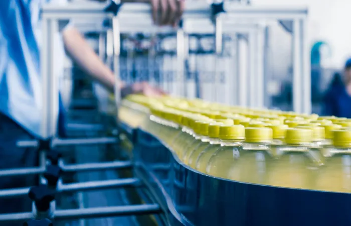 A production line – QI manufacturing software runs a job from the bill of materials to the finished piece
